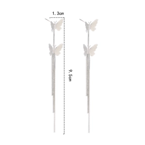 Detailed view of silver butterfly tassel earrings with 1.3cm width and 9.5cm length