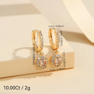 Boucles d'oreilles anneaux dorées avec zircons champagne et sertissage micro-pavé chic