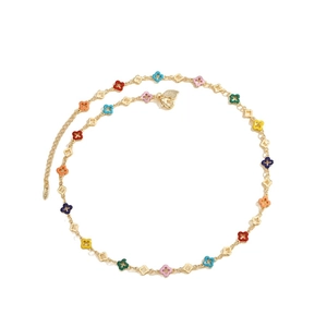 Colorful multi-leaf clover necklace with gold chain and multicolored enamel charms