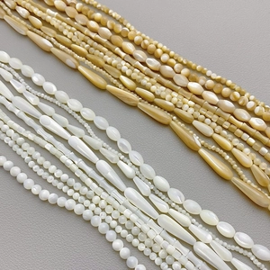 Natural shell beads in cylindrical and teardrop shapes for DIY jewelry making