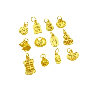 Set of twelve traditional gold-plated charms including lotus and abacus for DIY jewelry