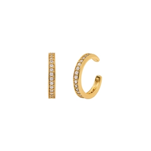 Detailed close-up of golden ear cuffs with pave-set zircon crystals on white background