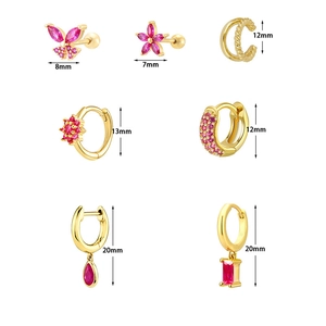 7-piece gold zircon earring set with red gemstones featuring butterfly and floral designs