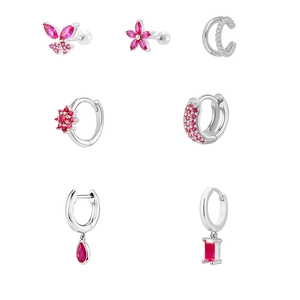 7-piece silver stud earring set with pink cubic zirconia stones and floral butterfly motifs