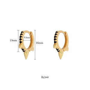 Detail view of gold hoop earrings with black zircon pavé and spike, showing 13mm size