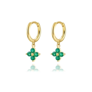 Macro shot of gold-plated clover earrings featuring faceted green zircon stones