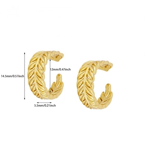 Detailed macro view showing the precise dimensions of gold-plated leaf-shaped ear cuffs