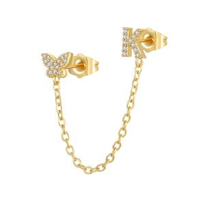 Detailed view of gold butterfly and letter K earring connector with pave zircon stones