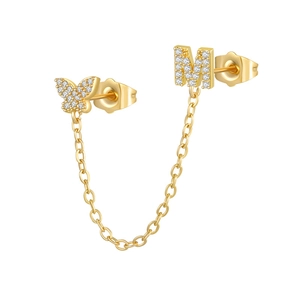 Detailed view of zircon butterfly and letter M stud earring set with golden link chain