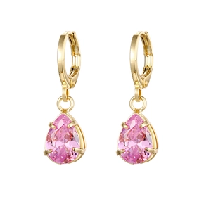 Macro view of gold teardrop earrings featuring pear-cut pink crystal in four-prong setting