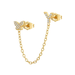 Macro detail of gold link earring featuring a zircon-studded butterfly and letter Y motif