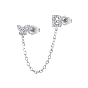 Close-up of zircon-encrusted butterfly and letter B ear stud with link chain in silver