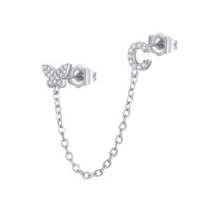 Detailed view of silver butterfly and letter C chain earring with zircon inlay