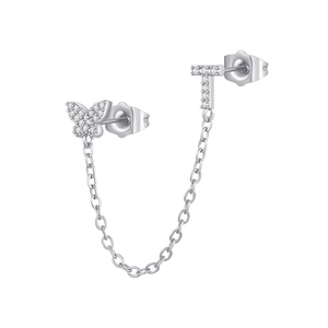 Close-up of zircon paved butterfly and letter T double ear piercing chain earring