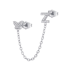 Detailed view of silver zircon butterfly and letter Z earring set with linked chain