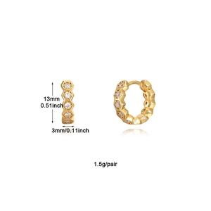 Minimalist gold hexagonal hoop earrings with sparkling cubic zirconia on white backdrop