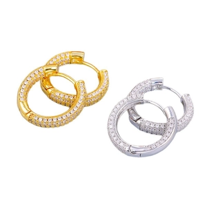 Luxurious hoop earrings with pavé set cubic zirconia in gold and silver finishes
