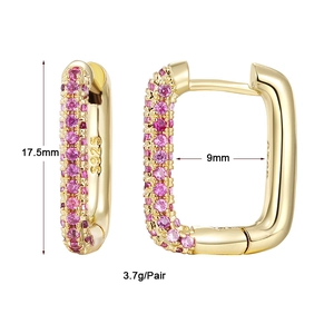 Detail view of gold-plated S925 silver hoop earrings with pave-set purple zircon stones