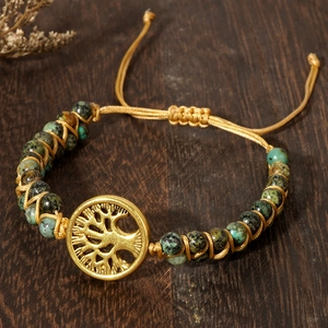 Handmade woven Tree of Life bracelet with natural turquoise beads and golden stainless charm