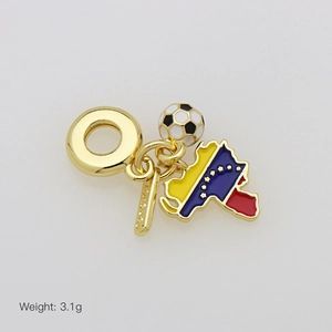 Detailed view of the soccer ball charm and Venezuela map pendant on a golden chain