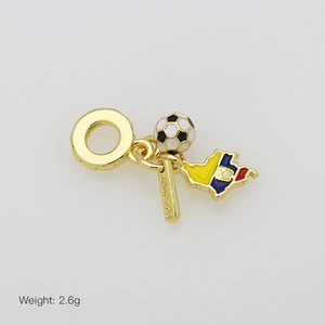 Detailed view of 18K gold charm with soccer ball and Ecuador map on snake chain
