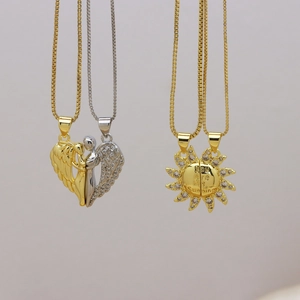 Magnetic couples necklace with detachable angel wings and You Are My Sunshine sun pendant