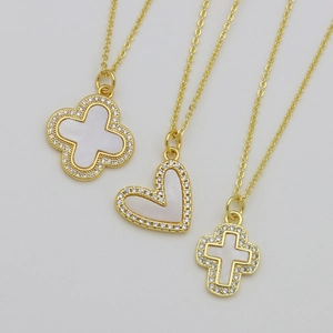Gold layering necklaces set with shell clover heart and cross pendants in zircon