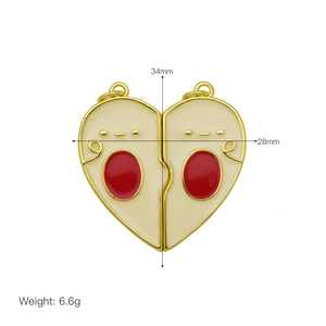 Detailed view of magnetic sun moon heart pendant showing 34mm height and 28mm width dimensions
