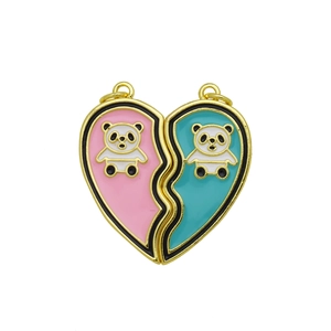 Detail of magnetic heart pendant with cartoon panda designs in pink and teal enamel