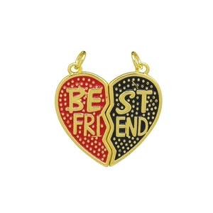 Detail view of heart-shaped magnetic puzzle pendants with red and black enamel textures