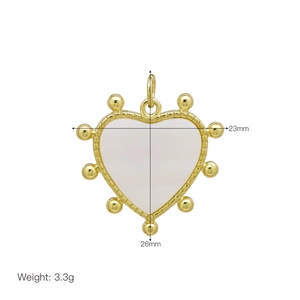 Detail showing gold heart shell pendant dimensions 23mm by 26mm weighing 3.3g