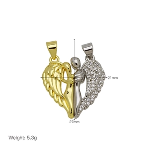 Detail of magnetic heart pendant with silver wings, zircon inlay and 27mm height