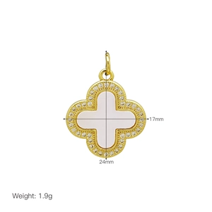 Detail showing 17mm x 24mm gold clover pendant with shell inlay and zircon edges