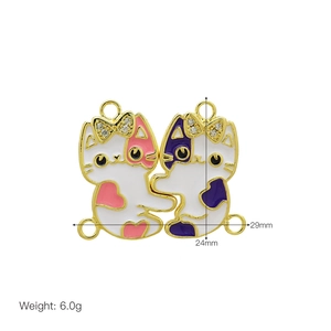 Detail view of two-piece cat pendants with enamel filling, dimensions 29mm by 24mm