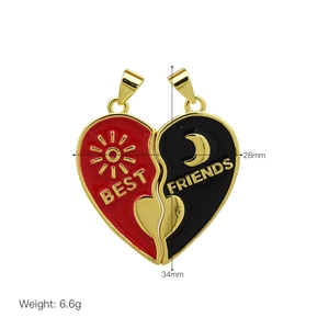 Detail of magnetic heart-shaped best friends pendant with sun and moon pattern