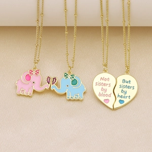 Two-piece sister necklace set with enamel elephants and magnetic split heart pendants