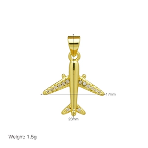 Close-up of 18K gold plated airplane pendant with zircon wings, size 17mm by 23mm