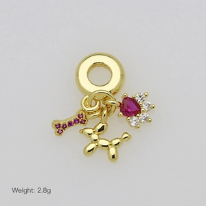 Detailed view of gold balloon dog pendant with pink zircon bone and crown heart charm
