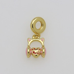 Detailed view of a golden heart charm with pink headphones and cat ear enamel detail