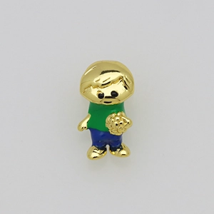 Detailed close-up of a gold-plated cartoon boy pendant with soccer ball and enamel finish