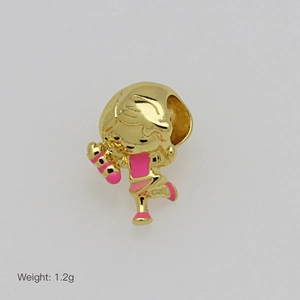 Detail of cartoon girl pendant in gold plating with pink enamel, weighing 1.2g