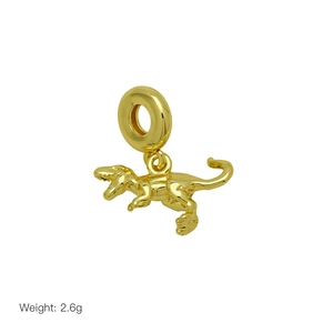 Golden dinosaur pendant charm for bracelet with 2.6g weight on white background