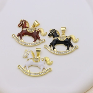 Three enamel rocking horse pendants in red, black, and white with sparkling zircon stones