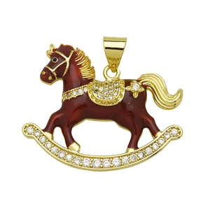 Detail of a gold-plated rocking horse pendant with red enamel and sparkling zircons
