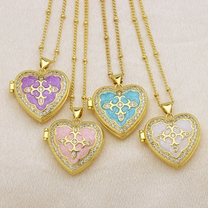 Elegant heart-shaped photo locket pendants in four colors with crystal accents