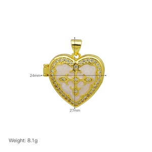 Detail of heart locket pendant with cross and white zircon stones 24x27mm