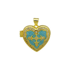 Detail of blue enamel heart locket pendant with gold finish and rhinestone cross inlay