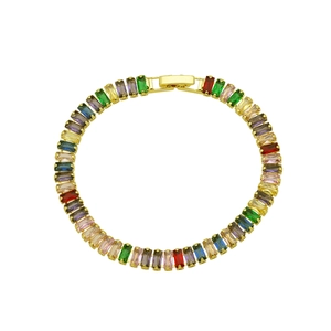Detail of 18K gold-plated tennis bracelet with baguette-cut rainbow cubic zirconia stones