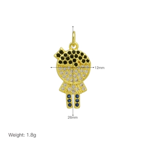 Detailed macro view of 18K gold plated boy girl pendant showing 26mm height and 12mm width