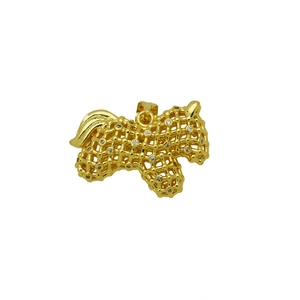 Close-up of golden Scottish Terrier pendant with hollow grid and inlaid zircons